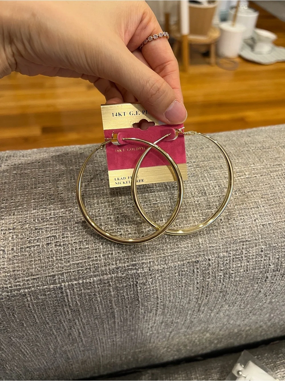70mm gold-tone hoop earrings.